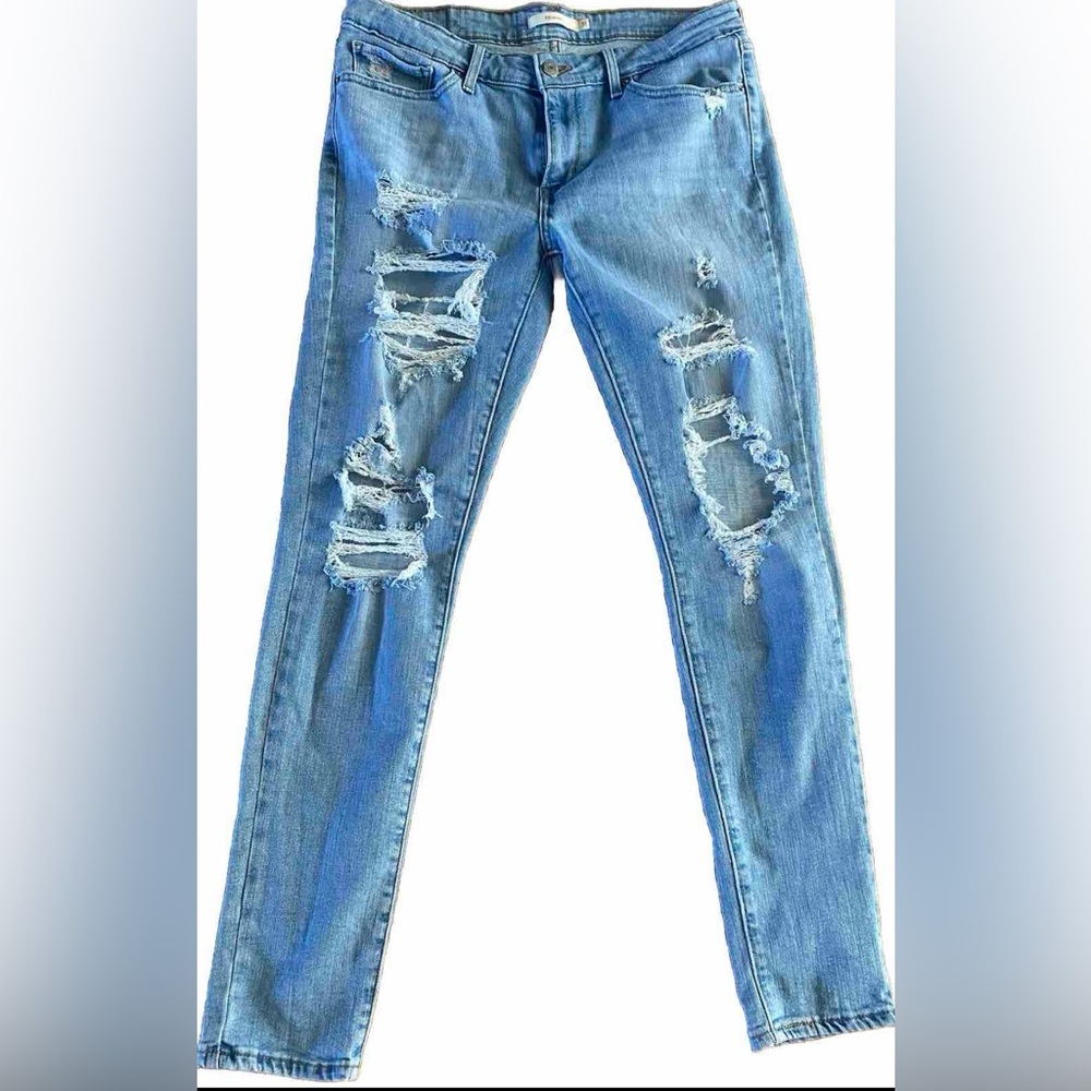 Levi 711 skinny jeans distressed